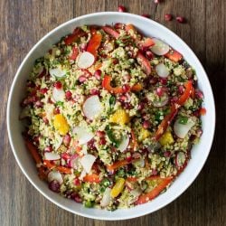 Authentic Moroccan Couscous salad. An exotic blend of heady spices, fresh fruits, tangy veggies and fluffy couscous | hurrythefoodup.com