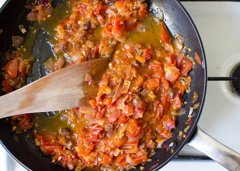 Quick Tomato Chutney - Anglo-Indian Cuisine made perfect - simmer all the ingredients into a medium heat #tomato #sweet | hurrythefoodup.com