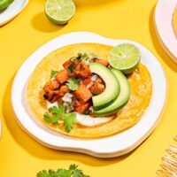 A sweet potato taco is assembled on a plate on a yellow surface | Hurry The Food Up - 8