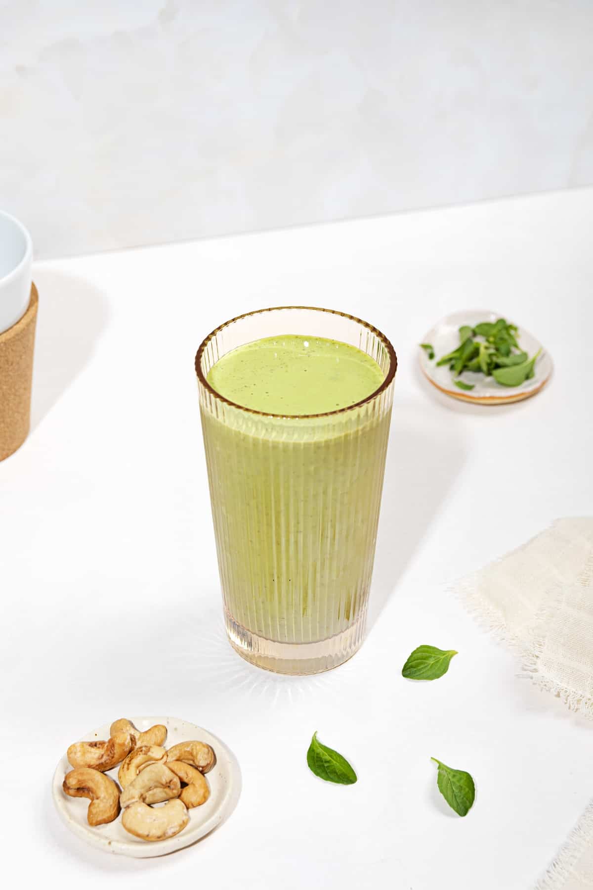 https://hurrythefoodup.com/wp-content/uploads/2022/05/mint-pineapple-and-spinach-smoothie-glass.jpg