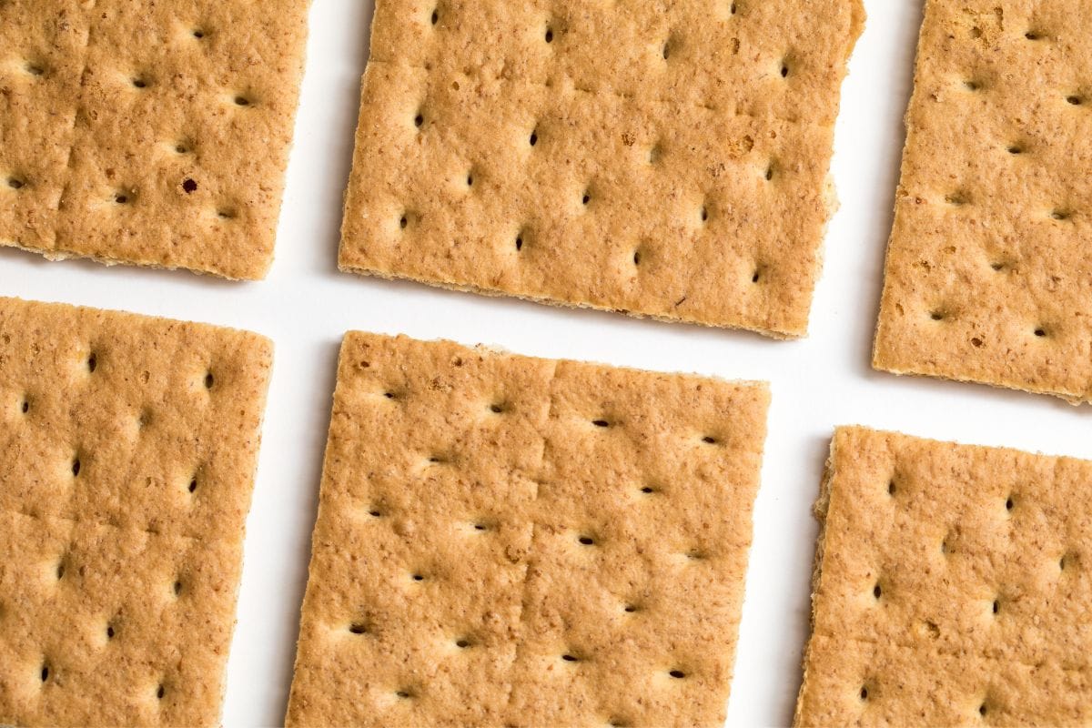 A few Graham crackers on a white surface | Hurry The Food Up