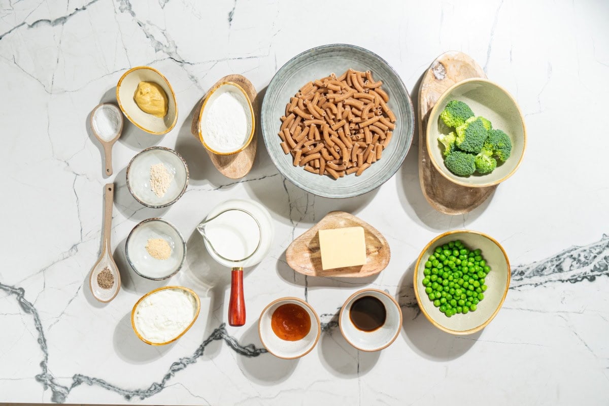 Ingredients for mac and cheese laid out on marble table | Hurry The Food Up