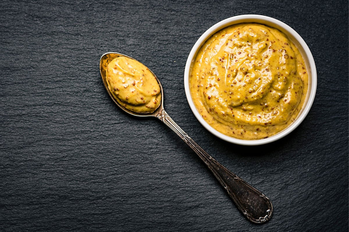 The small bowl and spoon with dijon mustard | Hurry The Food Up