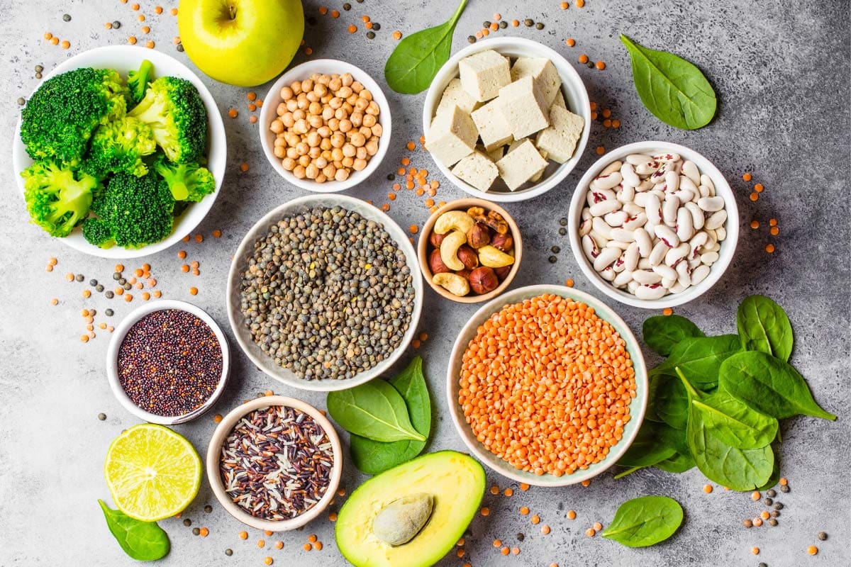 Sources of plant-based protein like broccoli, chickpeas, nuts, apple, beans, lentils, avocado etc | Hurry The Food Up