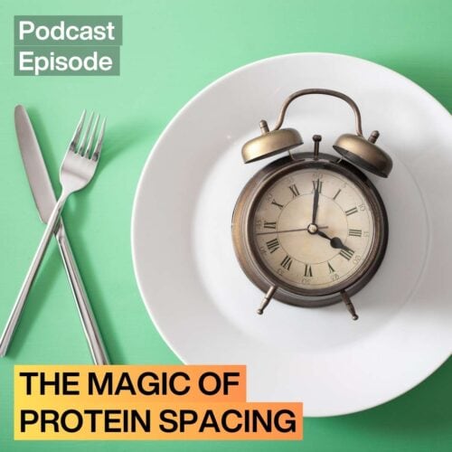 A clock on a plate with cutlery nearby