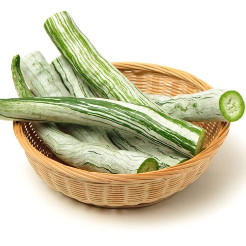 Snake gourds in the wicker bowl