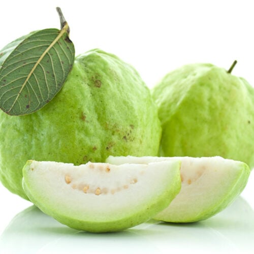 Two white guavas and slices