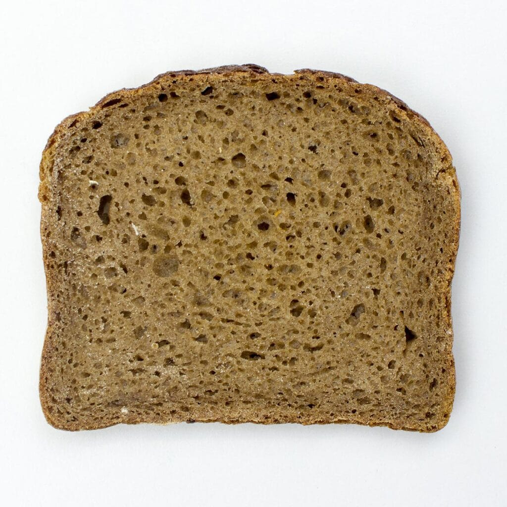 Slice of bread on white background