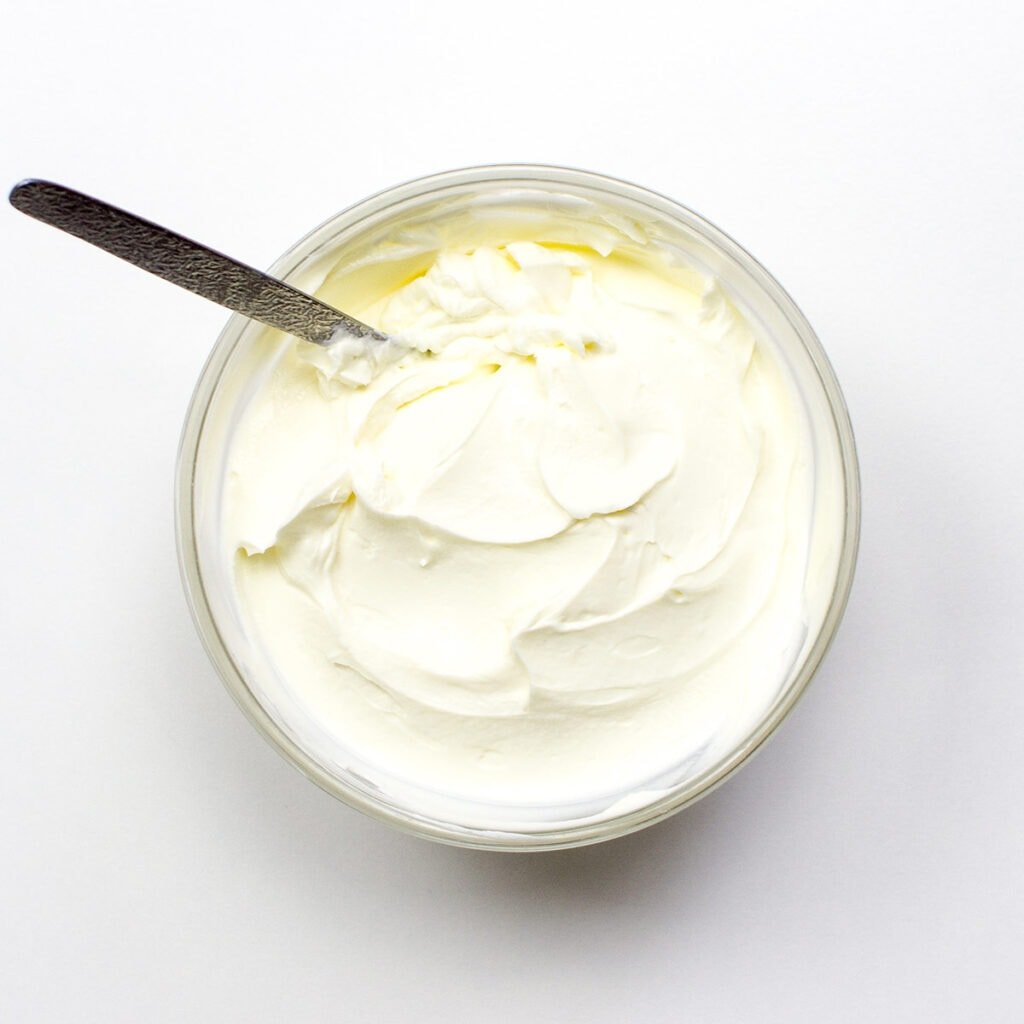 Cream cheese on white background