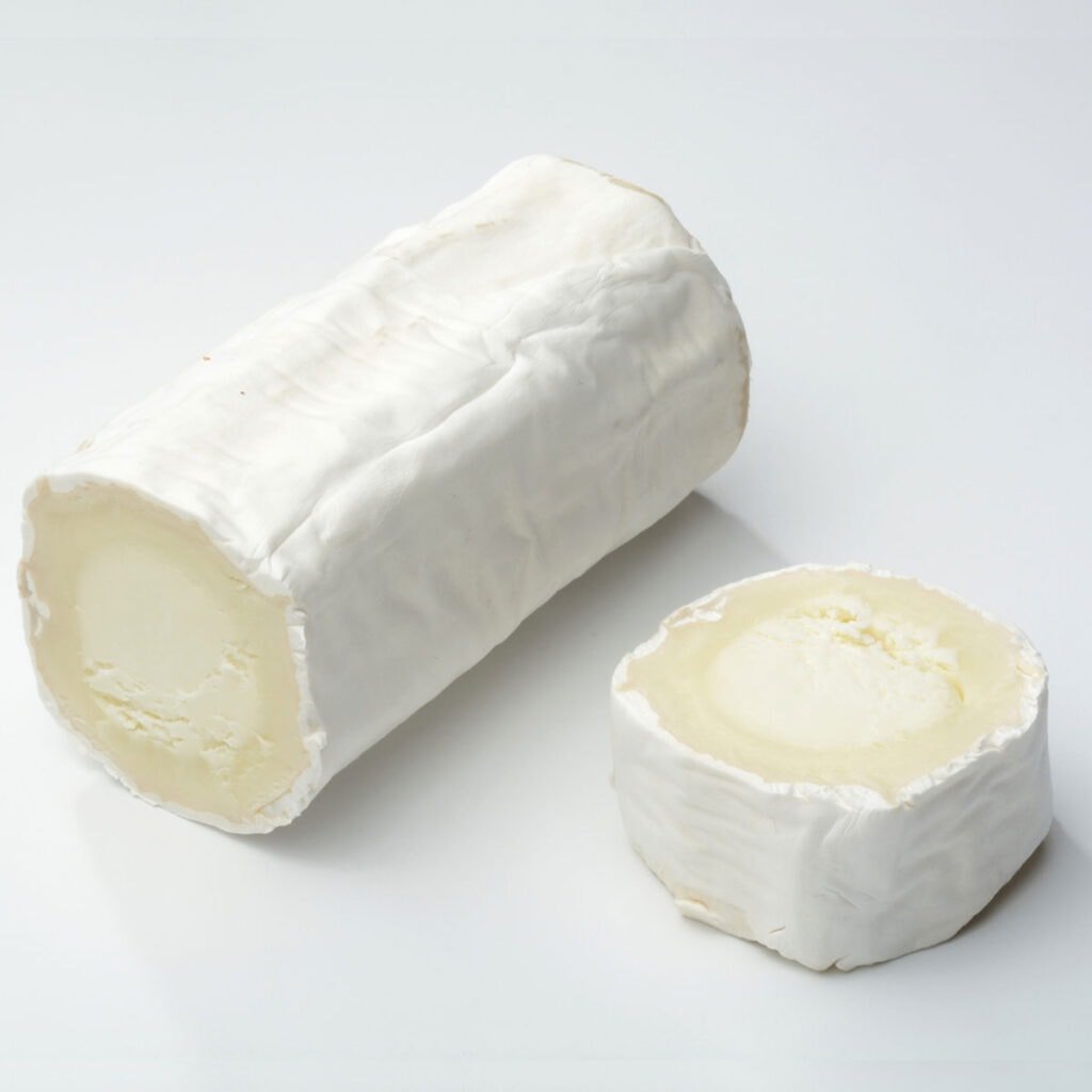 Goat cheese on white background