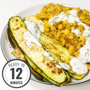 A plate of Fried Chickpeas with Zucchini (Courgette) and Yoghurt with a timestamp in the left corner.