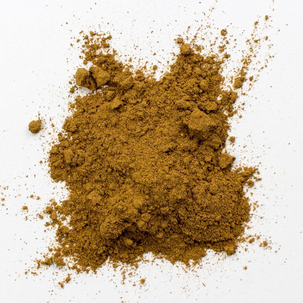 Cinnamon on white surface