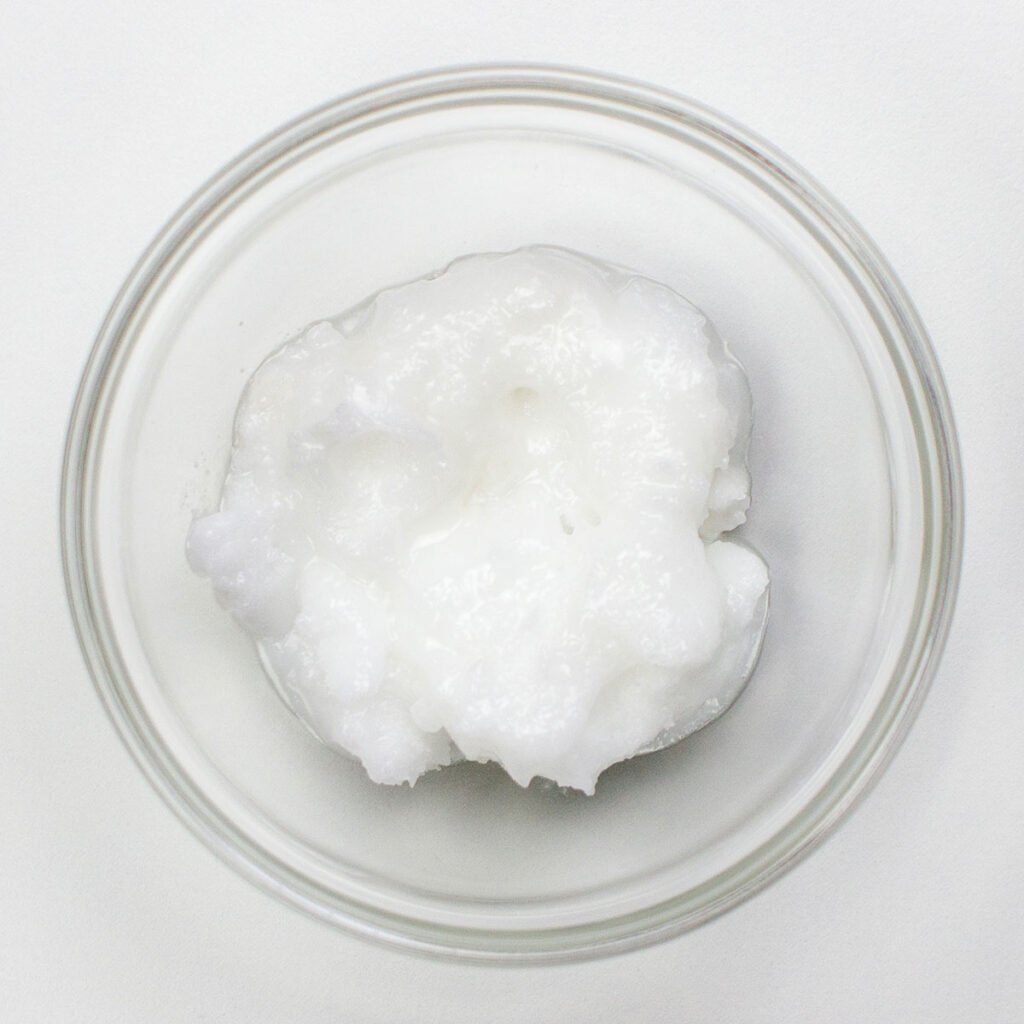 Coconut oil on white surface